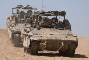 Israeli armoured personnel carriers (APC) manoeuvre, near the Israel-Gaza border, amid the ongoing conflict between Israel and the Palestinian Islamist group Hamas, in Israel, April 15, 2024. PHOTO/REUTERS